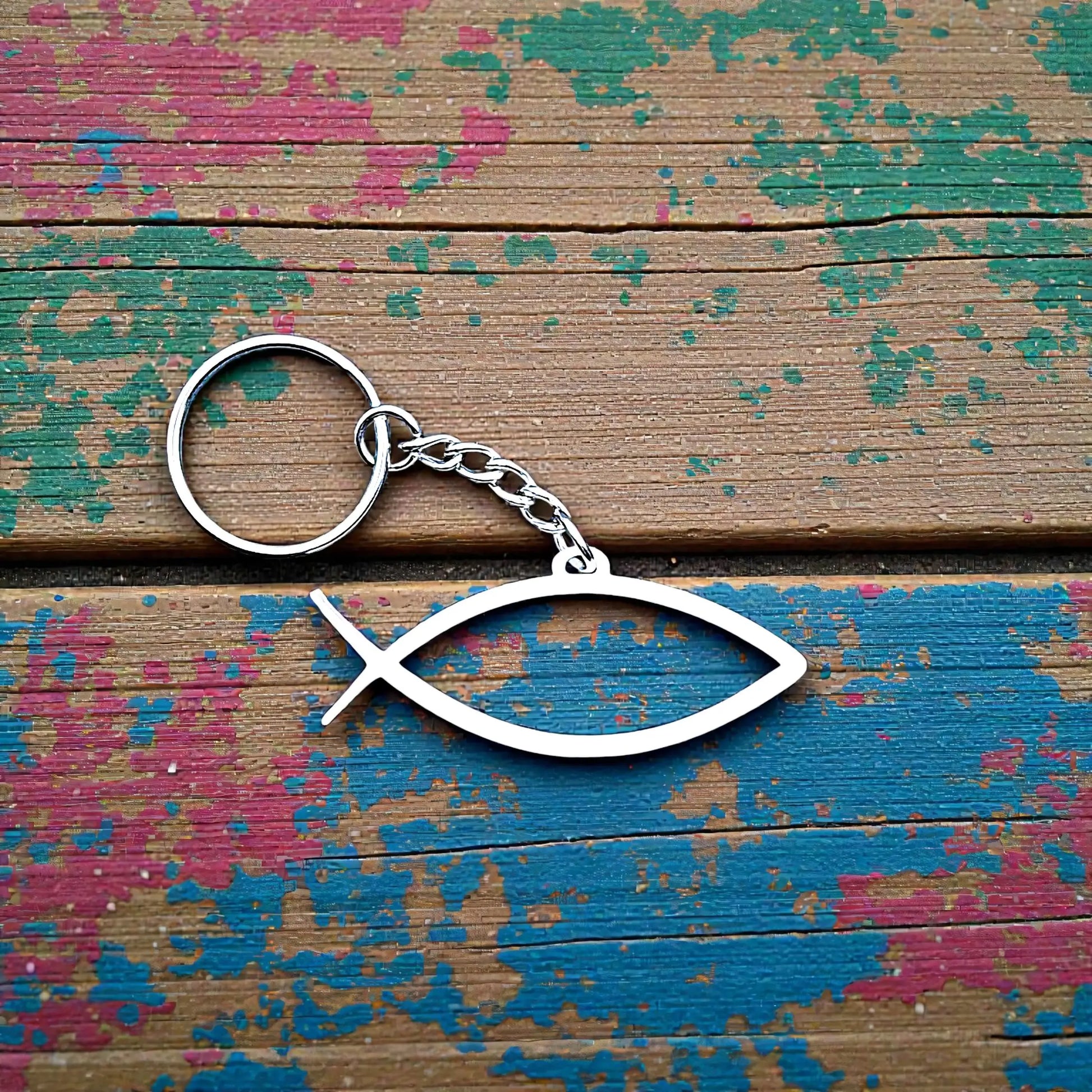 Handmade and customizable Ichthys Fish Keychains in white, inspirational religious charms for Easter gifts, VBS giveaways, and church favors.
