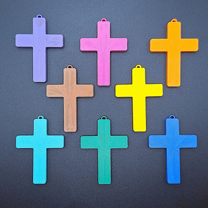 Front view of eight vibrant cross keychains, eco-friendly and handmade, ideal for VBS, church events, and meaningful faith-based gifts.