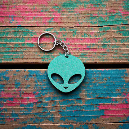 Alien head keychain in mistletoe green, perfect for sci-fi fans, party favors, or fun personalized gifts.