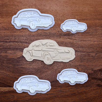 Handmade and customizable antique roadster car cookie cutters and stamps alongside a dough cutout and imprint, perfect for vintage car themed cookies, birthdays and gifting.