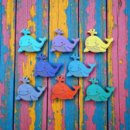 Handmade and customizable whale keychains featuring a friendly aquatic design, perfect for classroom prizes, party favors for kids birthdays, and unique bag charms.