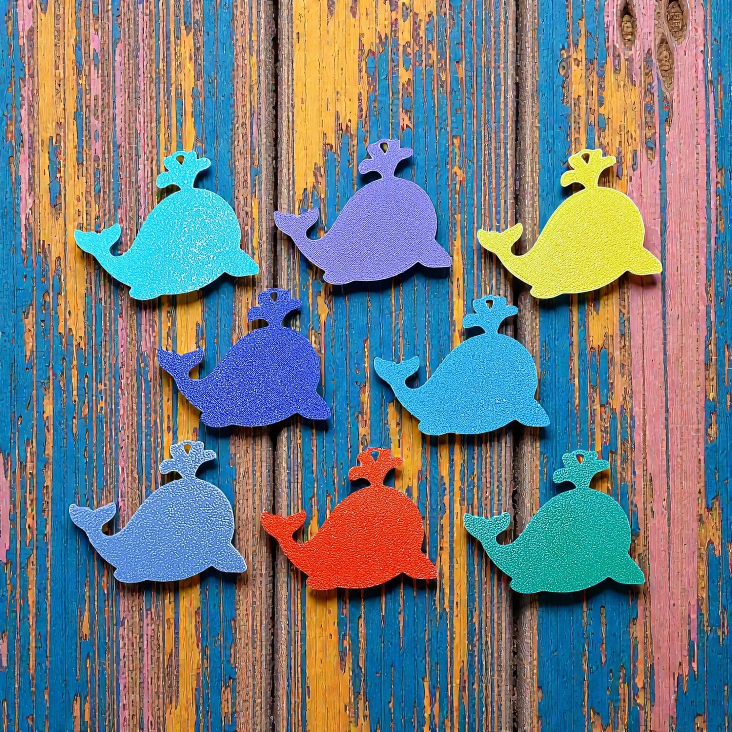 Reverse of handmade and customizable whale keychains, perfect for classroom prizes, party favors for kids birthdays, and unique bag charms.