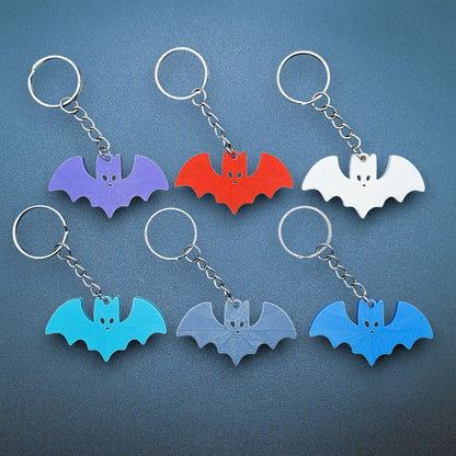 Set of 6 colorful bat keychains—eco-friendly spooky charms, perfect for Halloween gifts, party favors, or gothic-themed keyring collections.