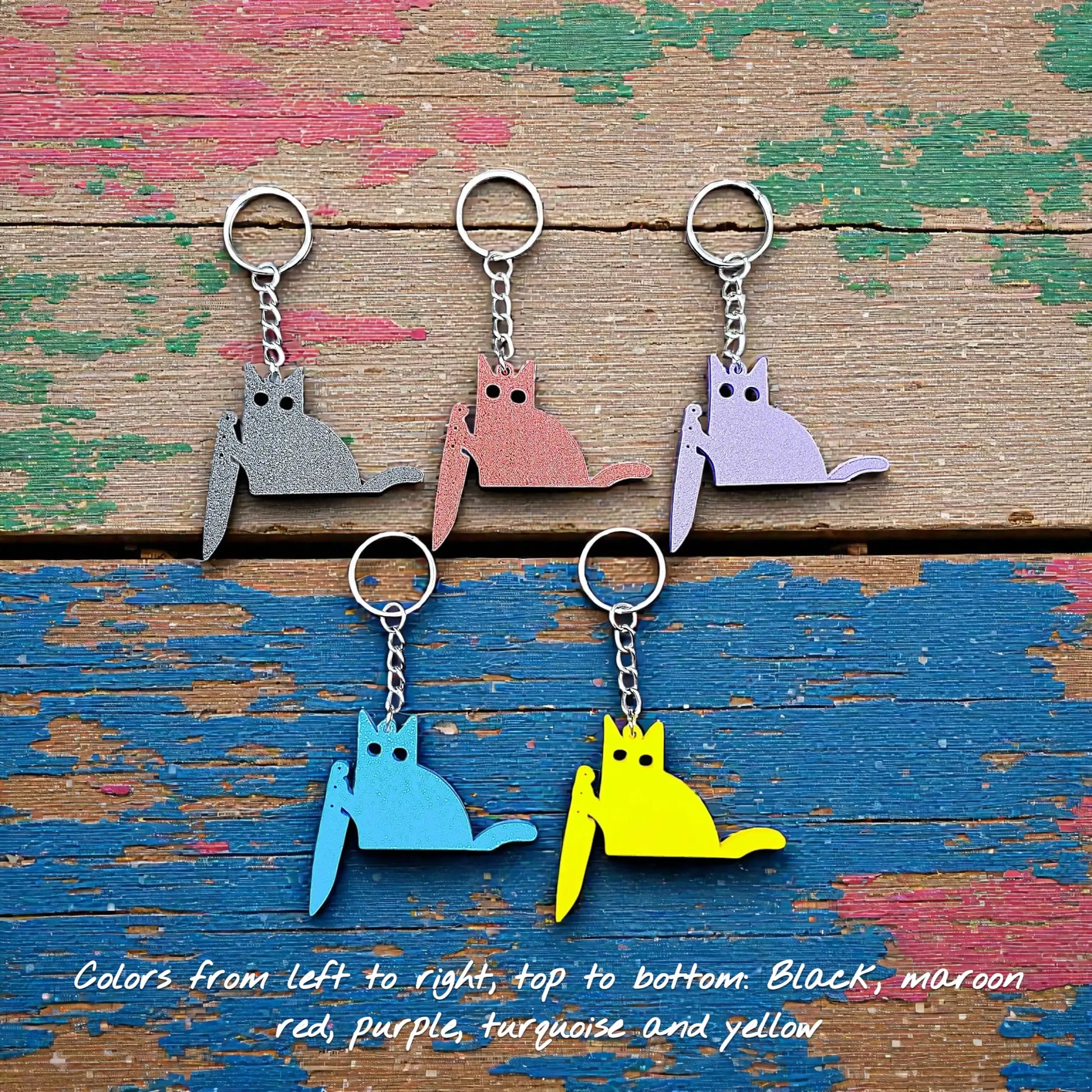 Handmade and customizable black cat keychains in five colors, great for creepy cute key rings, trick or treat gifts, and Halloween parties.