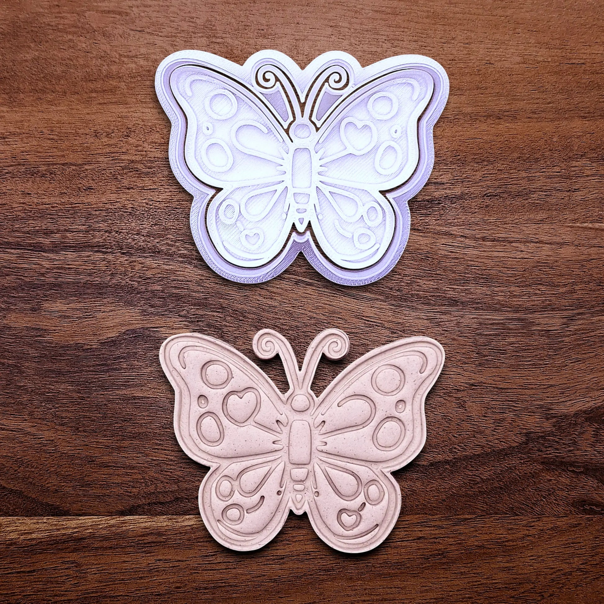 Handmade and customizable butterfly cookie cutter with stamp and dough cutout and imprint, perfect for spring baking, garden party treats, birthdays, events, weddings, fondant decorations, and whimsical cookie designs.