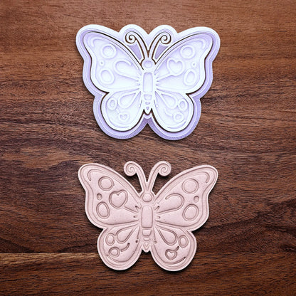 Handmade and customizable butterfly cookie cutter with stamp and dough cutout and imprint, perfect for spring baking, garden party treats, birthdays, events, weddings, fondant decorations, and whimsical cookie designs.
