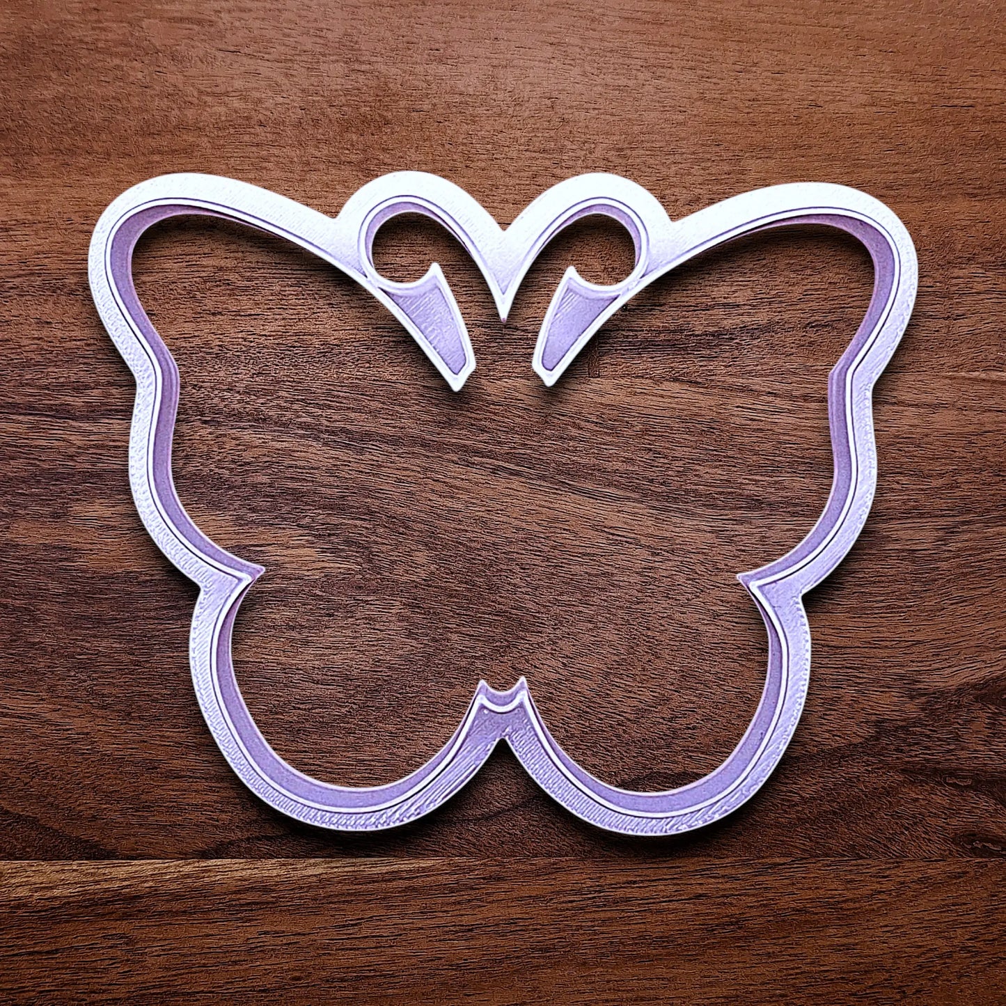 Handmade and customizable butterfly cookie cutter, perfect for spring baking, garden party treats, birthdays, events, weddings, fondant decorations, and whimsical cookie designs.