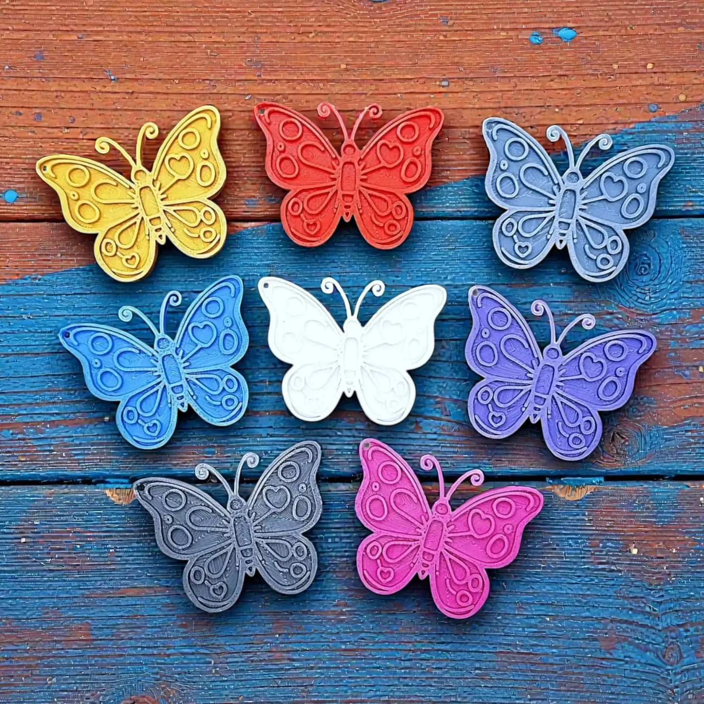 Handmade and customizable butterfly keychains in various colors, perfect for gifts, party favors, or nature-themed accessories.