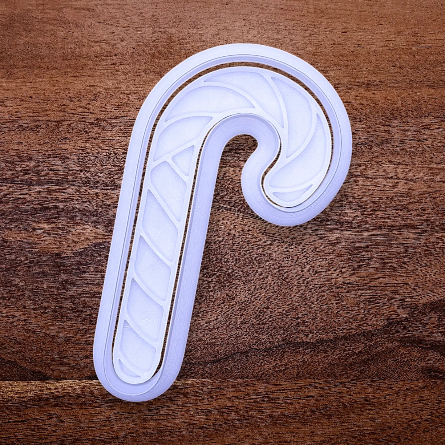 Handmade and customizable Christmas holiday Candy Cane Cookie Cutter and Stamp - stamp adds stripe details for Christmas cookies, festive gifts, and fun seasonal family baking activities.