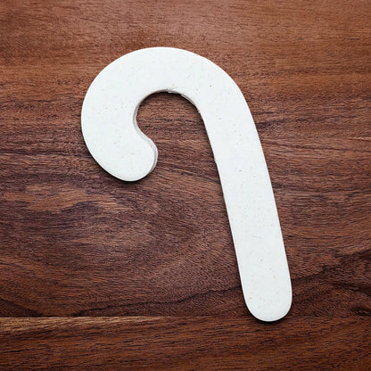Handmade and customizable Christmas holiday Candy Cane Cookie Cutter dough cutout - great for Christmas cookies, festive gifts, and fun seasonal family baking activities.
