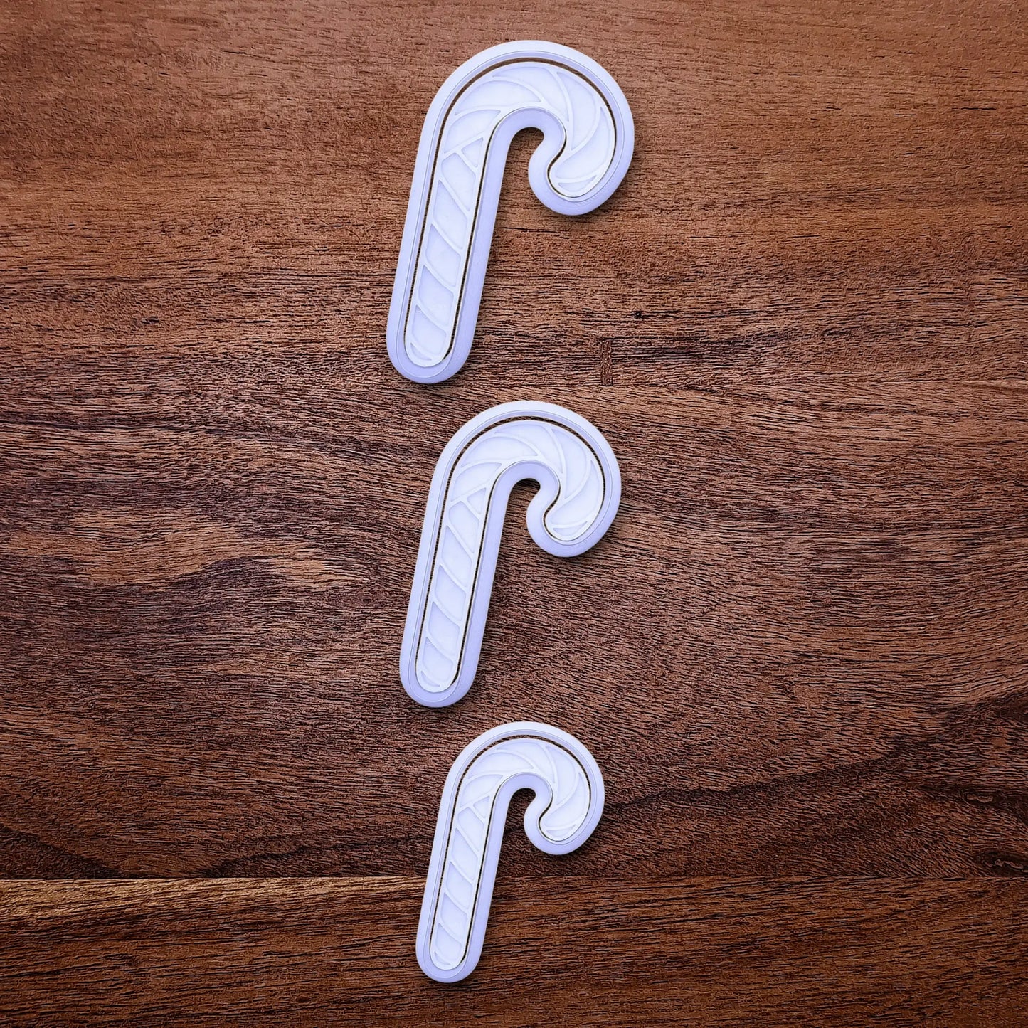 Handmade and customizable Christmas holiday Candy Cane Cookie Cutters and Stamps - stamp adds stripe details for Christmas cookies, festive gifts, and fun seasonal family baking activities.