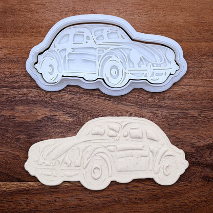 Handmade and customizable punch buggy car cookie cutter and stamp alongside a dough cutout and imprint, perfect for vintage car themed cookies, birthdays and gifting.