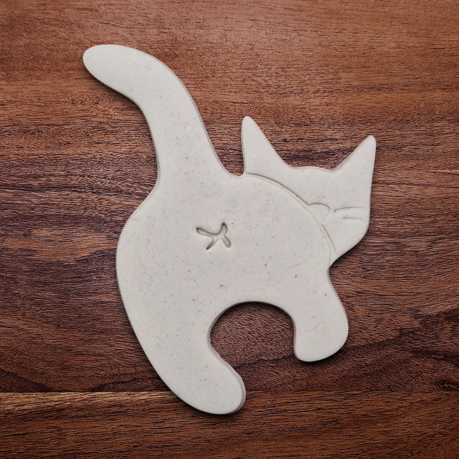 Cat butt cookie cutter dough cutout and imprint, perfect for gifting, gag gifts, white elephant gifting, and cat themed parties and treats.