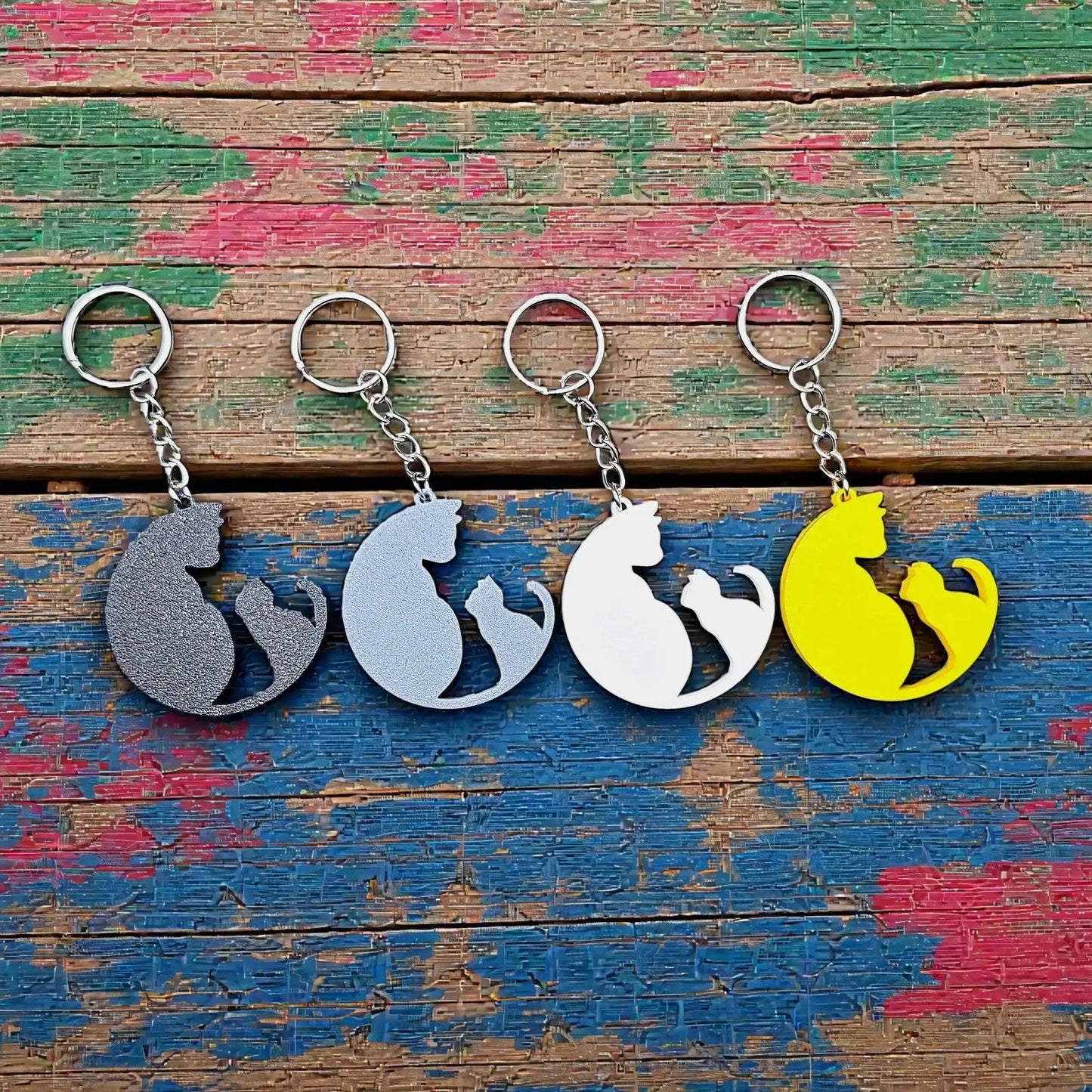 Handmade and customizable cat and kitten keychains in different colors, perfect for pet parents, gift sets and animal rescues.