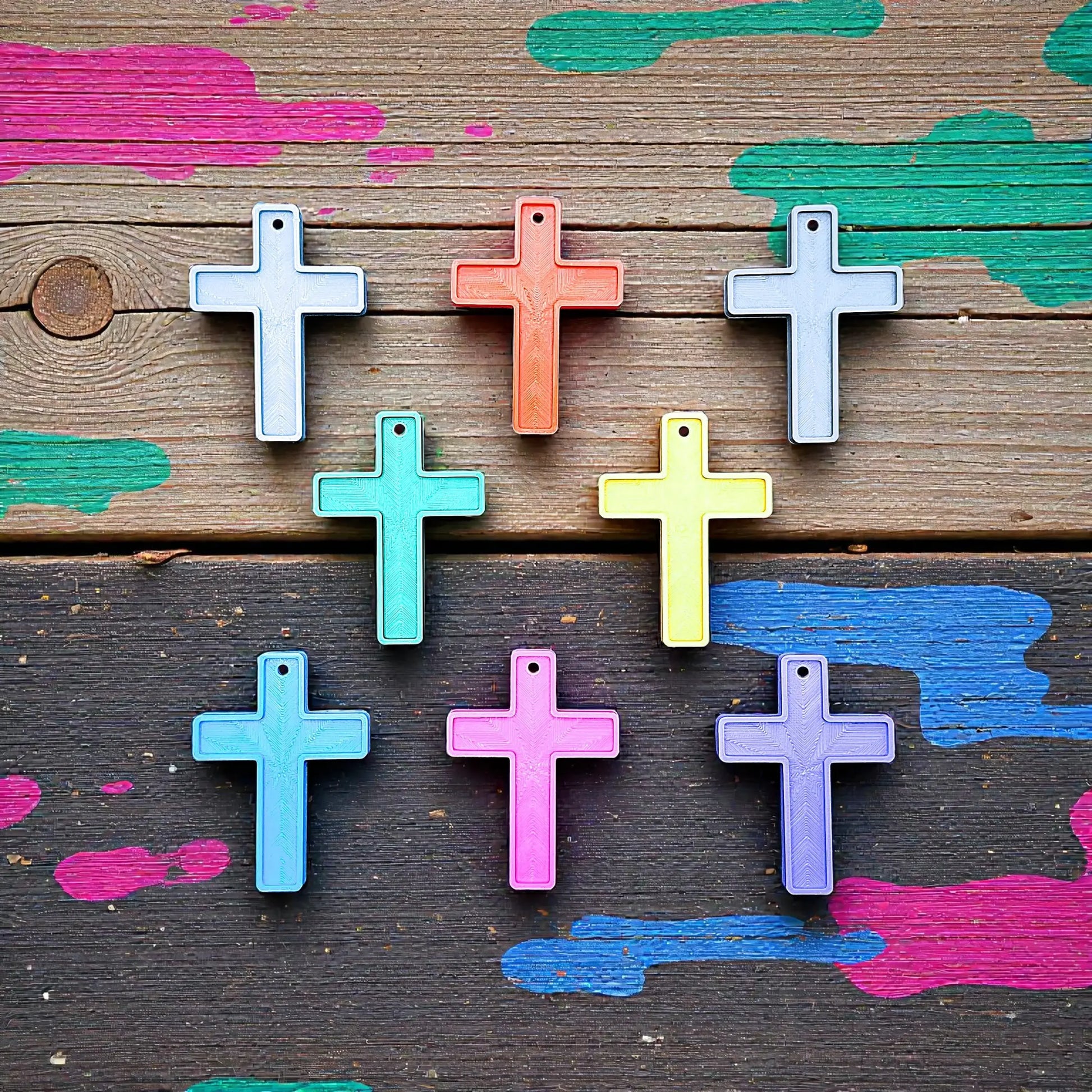 Handmade and customizable cross keychains in various colors, perfect for church events, VBS, religious gifts, and faith-based keepsakes.