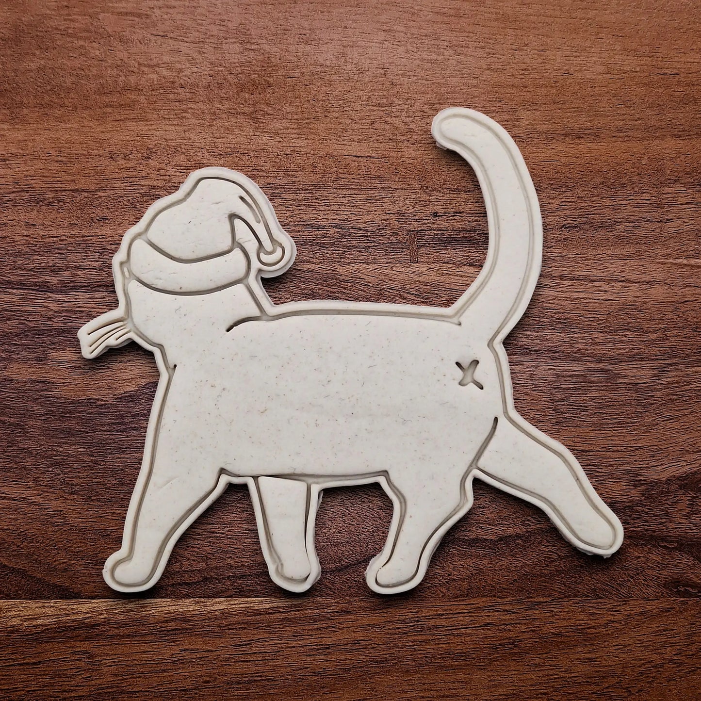 Funny Santa Hat Cat Butt Cookie Cutters dough cutout and imprint, available in a 3-piece set or individual sizes, perfect for baking, fondant, crafts, gag gifts and white elephant parties.