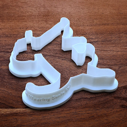 Funny Santa Hat Cat Butt Cookie Cutter and Stamp, available in a 3-piece set or individual sizes, perfect for baking, fondant, crafts, gag gifts and white elephant parties.