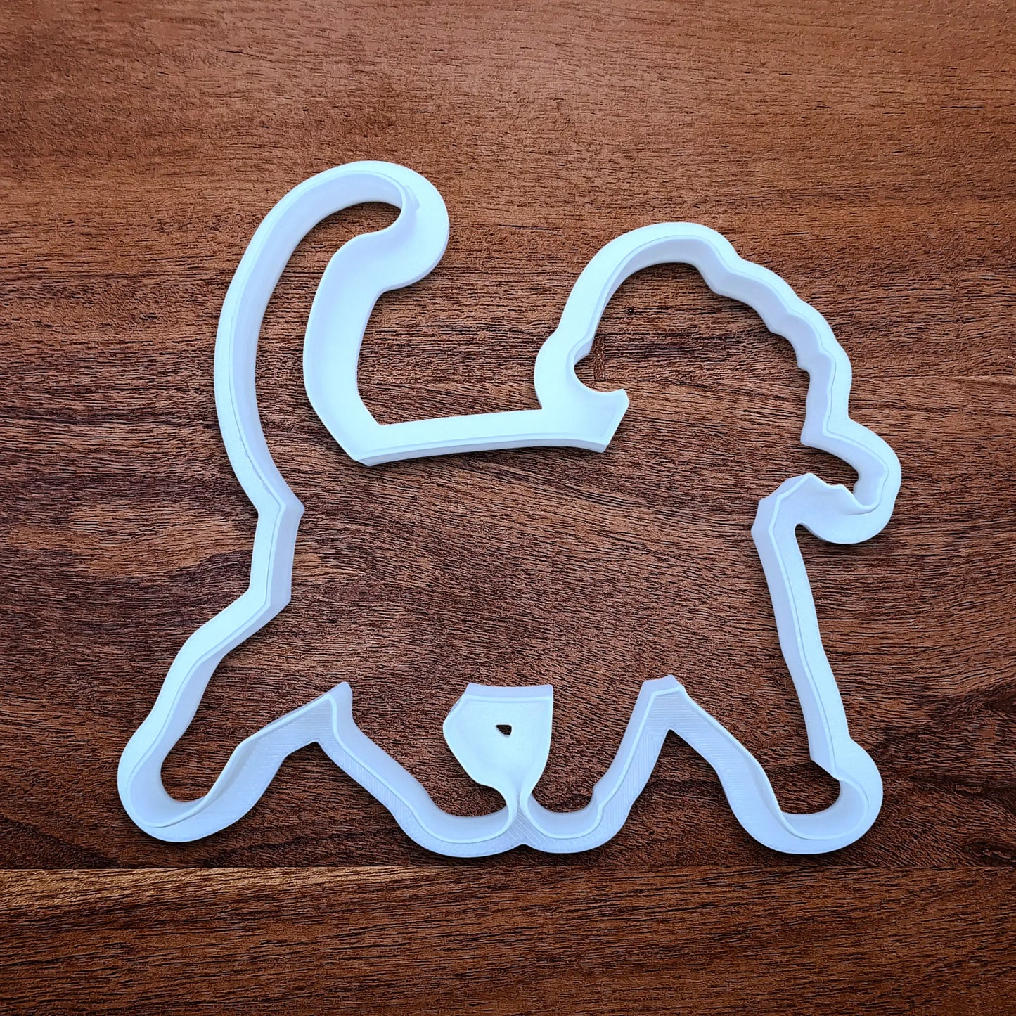 Funny Santa Hat Cat Butt Cookie Cutter, available in a 3-piece set or individual sizes, perfect for baking, fondant, crafts, gag gifts and white elephant parties.
