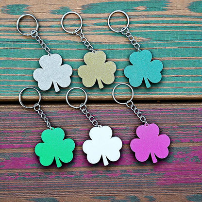 Handmade and customizable shamrock keychains in multiple colors, perfect for St Patrick's Day party favors and gifts.