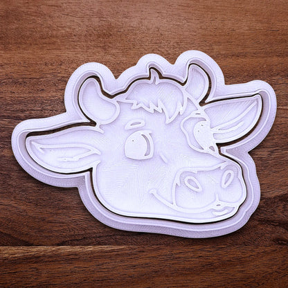 Handmade and customizable cow cookie cutter and stamp, perfect for farm-themed baking and kids’ country birthday party treats.