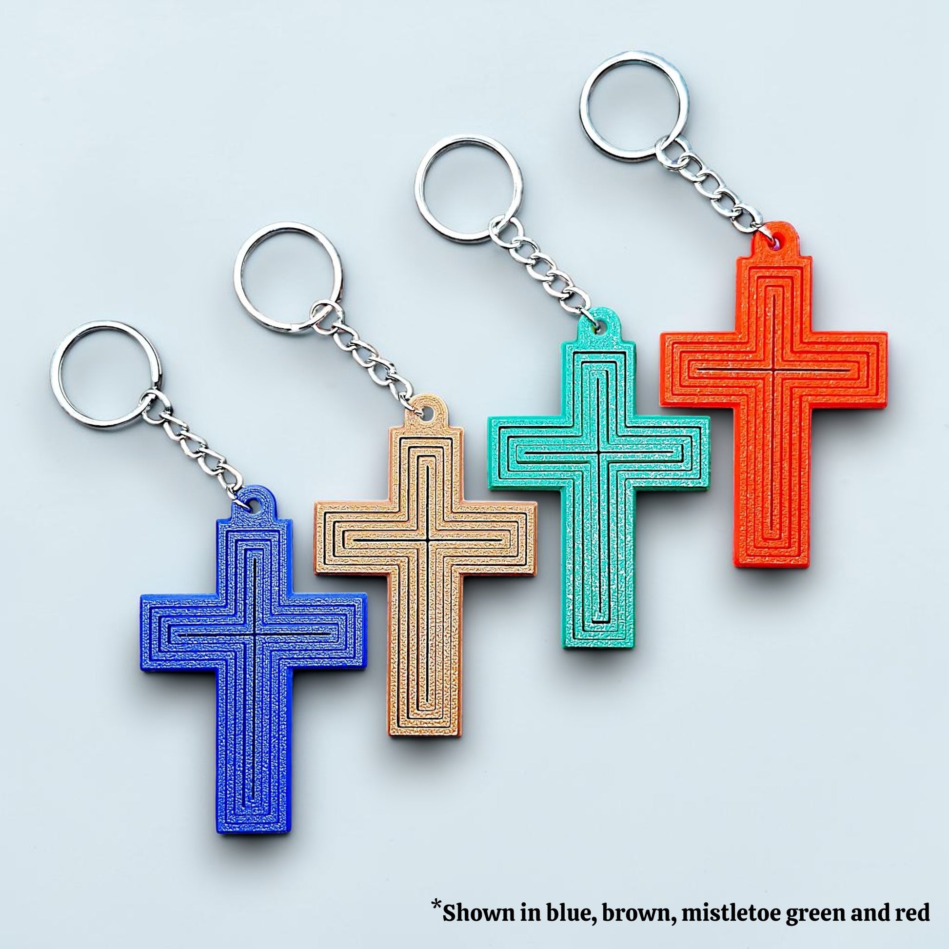 Handmade and customizable articulated cross keychains in unique colors, ideal for personalized gifts, church events, VBS, and faith-based accessories.