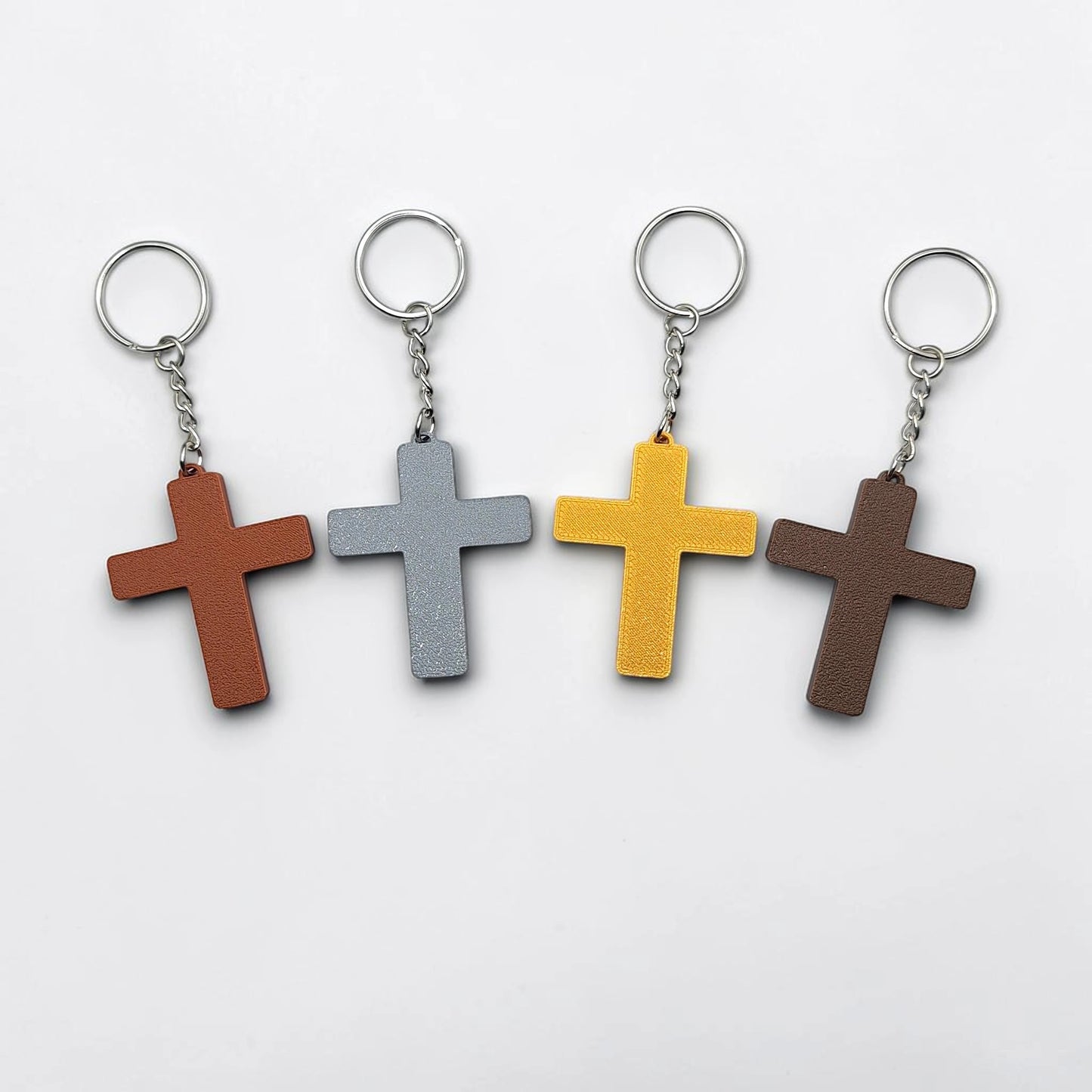 Handmade and customizable cross keychains in various colors, perfect for church events, VBS, and faith-inspired gifts.