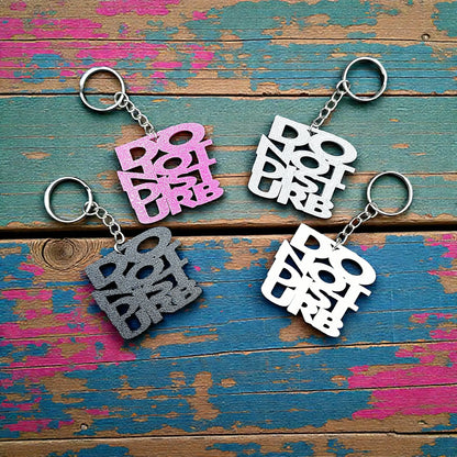 Handmade and customizable Do Not Disturb keychains in assorted colors, perfect gift for introverts or gamers.
