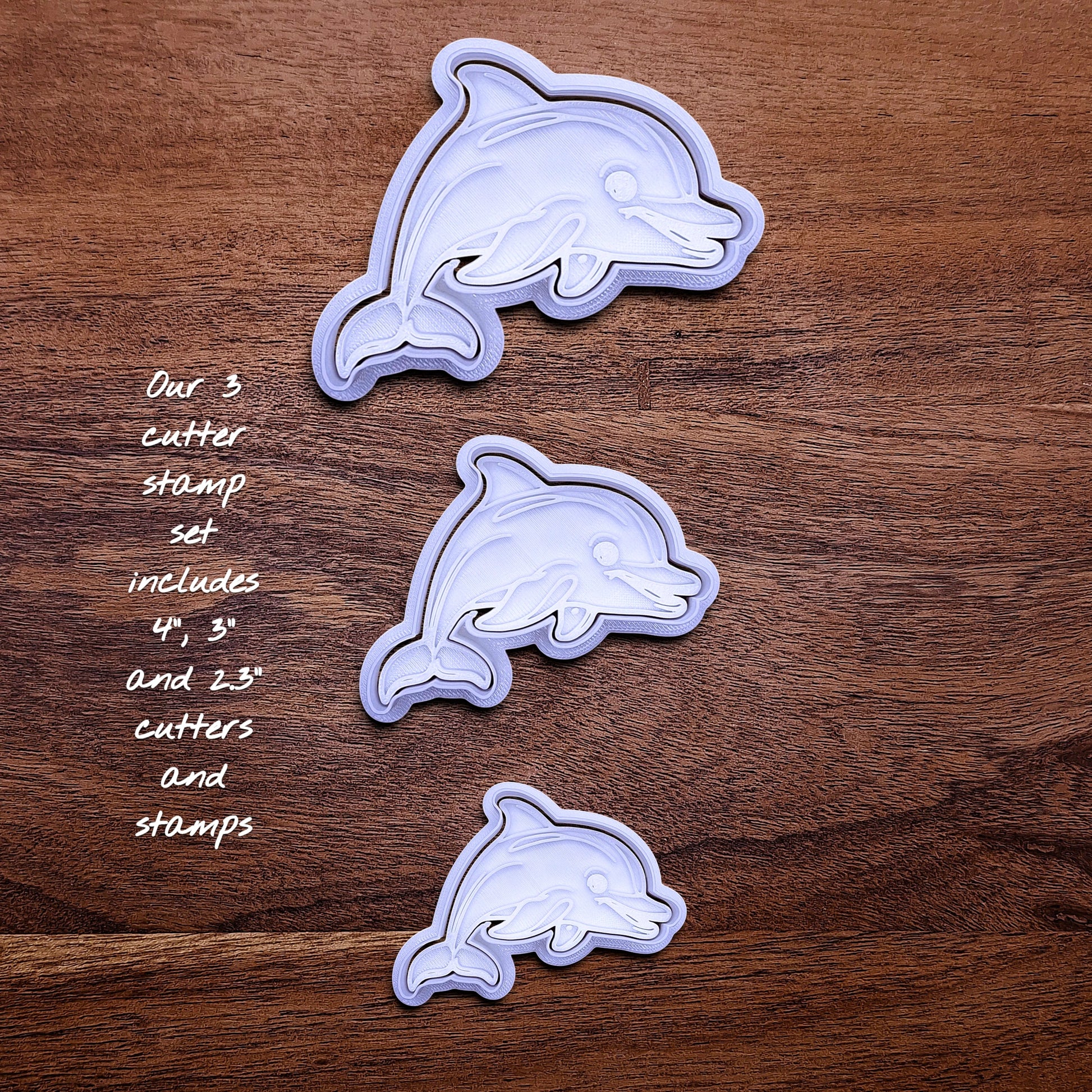 Handmade and customizable dolphin cookie cutter stamp set in three sizes, perfect for ocean-themed cookies, birthdays, aquatic fondant toppers, and sea animal baking projects.