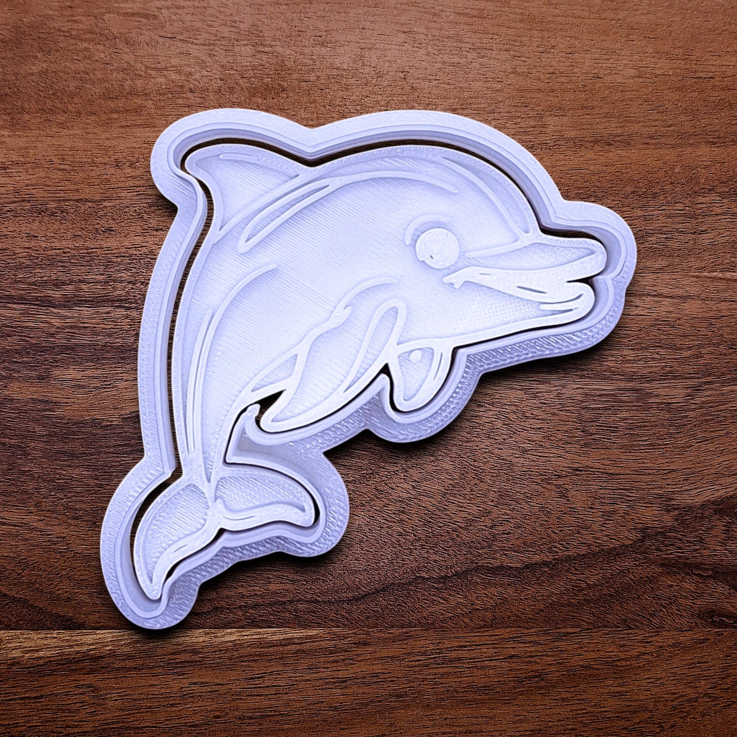 Handmade and customizable dolphin cookie cutter and stamp set, perfect for ocean-themed cookies, birthdays, aquatic fondant toppers, and sea animal baking projects.