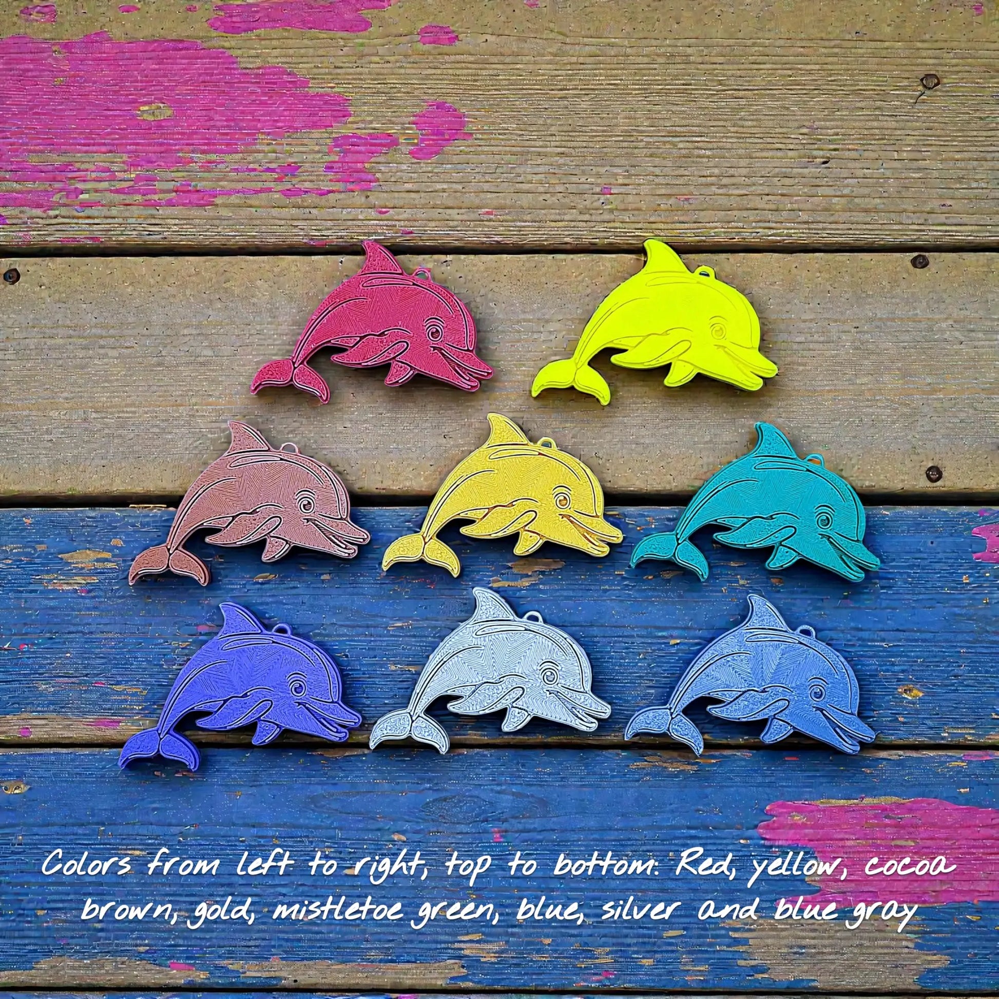 Handmade and customizable dolphin keychains in various colors, perfect for classroom prizes, party favors for kids birthdays, and unique bag charms.