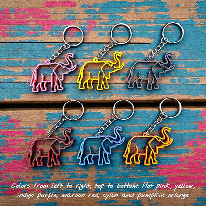 Handmade and customizable safari elephant keychains in various colors, perfect for classroom prizes, party favors for kids birthdays, baby showers and unique stocking stuffers.