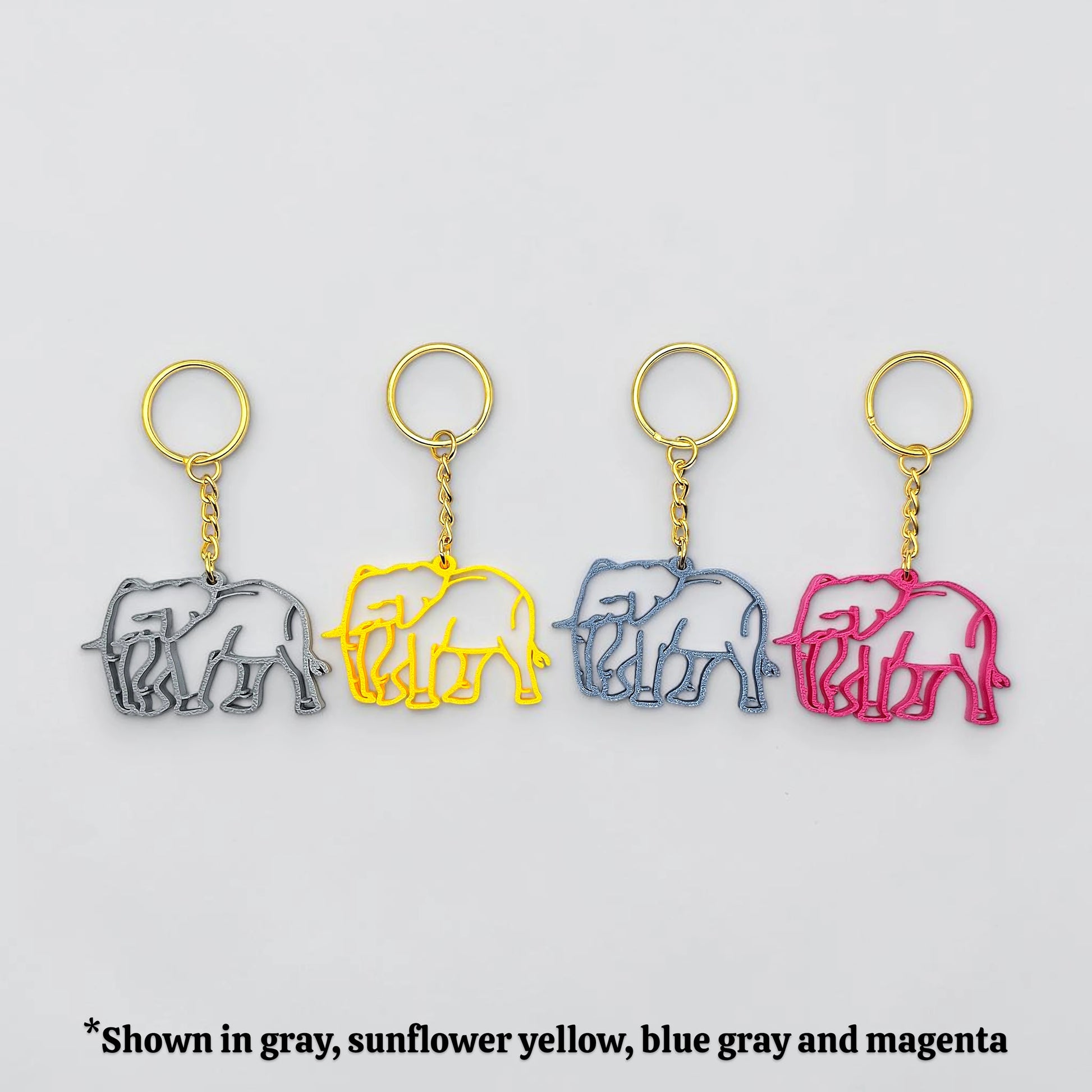 Handmade and customizable safari elephant keychains in assorted colors, perfect for classroom prizes, party favors for kids birthdays, baby showers and unique stocking stuffers.