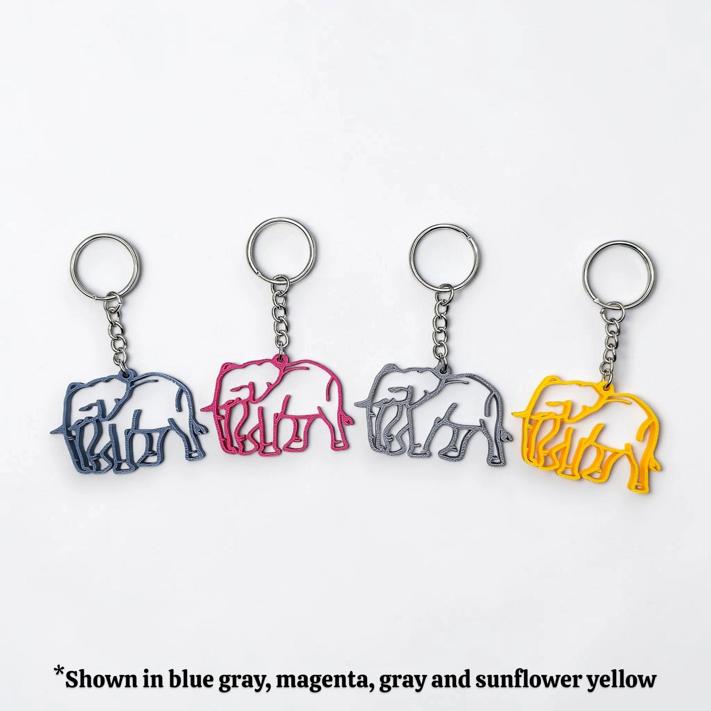 Handmade and customizable safari elephant keychain in silver, perfect for classroom prizes, party favors for kids birthdays, baby showers and unique stocking stuffers.