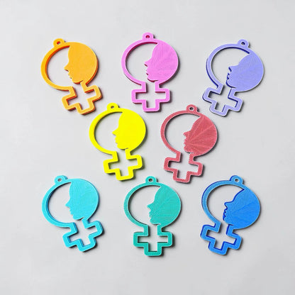 Reverse of handmade and customizable women empowerment keychains in assorted colors, perfect for event giveaways and gifts for feminists.