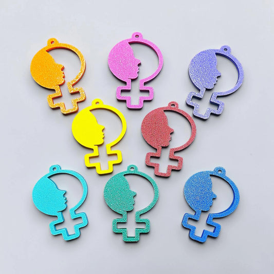 Handmade and customizable women empowerment keychains in multiple colors, perfect for event giveaways and gifts for feminists.