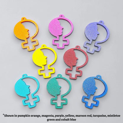 Handmade and customizable women empowerment keychains in various colors, perfect for event giveaways and gifts for feminists.