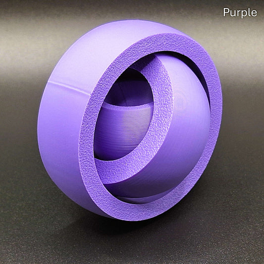 Purple smooth gyro spinner with a sleek, seamless exterior, made from biodegradable PLA for anxiety relief and quiet sensory play.