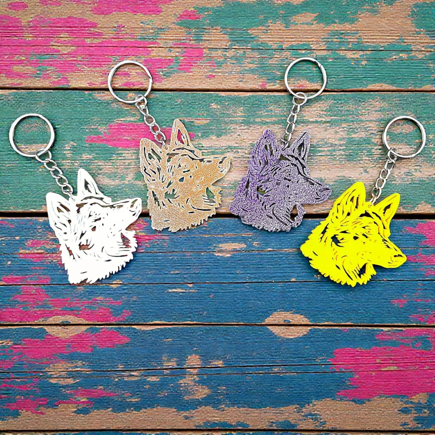Handmade and customizable German Shepherd keychains in assorted colors, perfect for dog moms, dog lovers, GSD pet parents, or custom gifts.