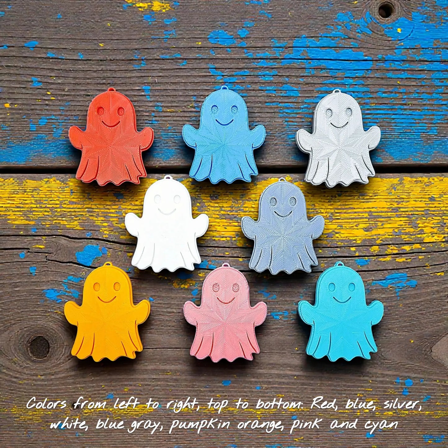 Handmade and customizable ghost keychains in eight colors, perfect for Halloween party favors, trick or treats, and fun Fall gifting for kids.
