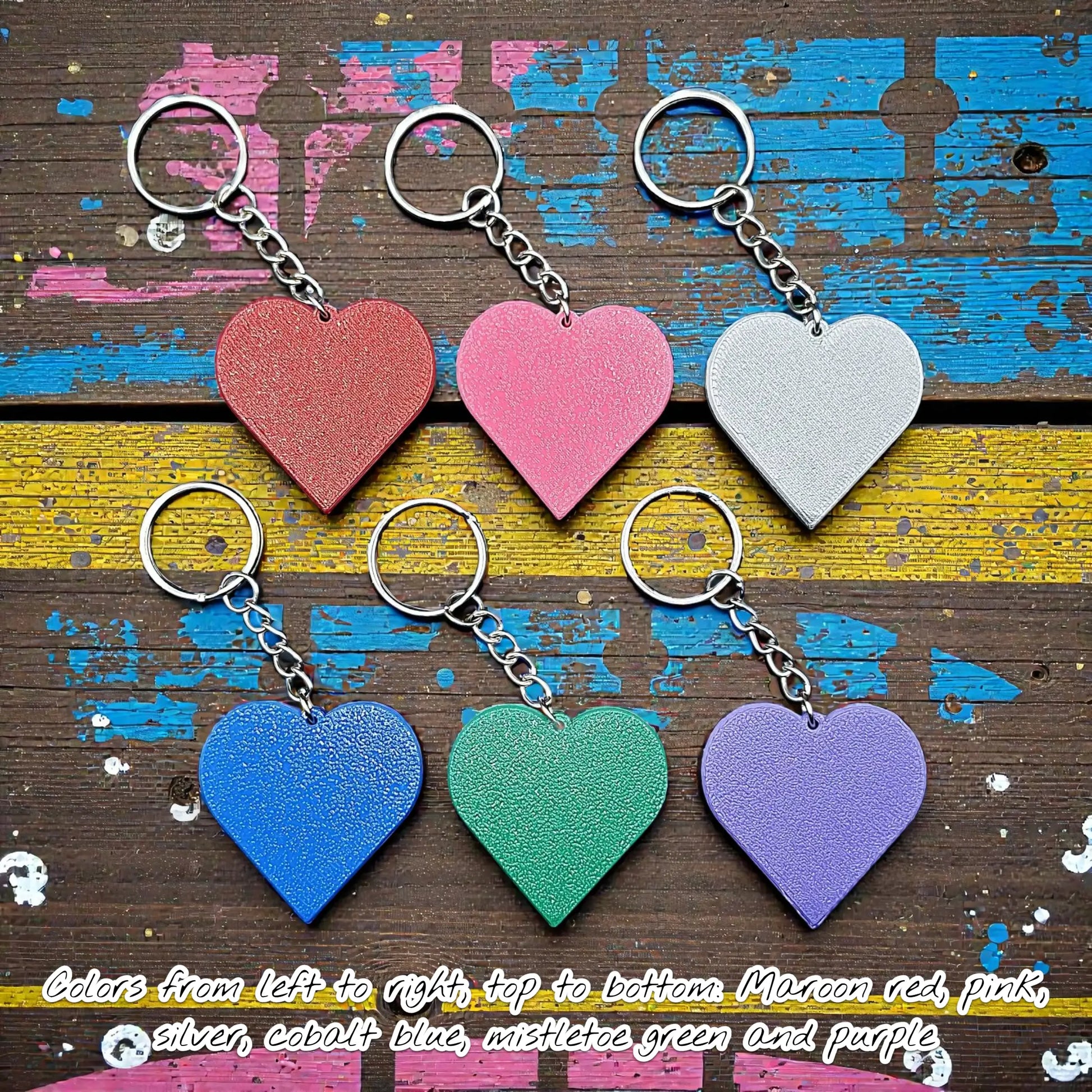 Handmade and customizable heart keychains in six different colors, perfect for classroom prizes, Valentine's Day gifts, party favors for kids birthdays, baby showers and unique backpack charms.