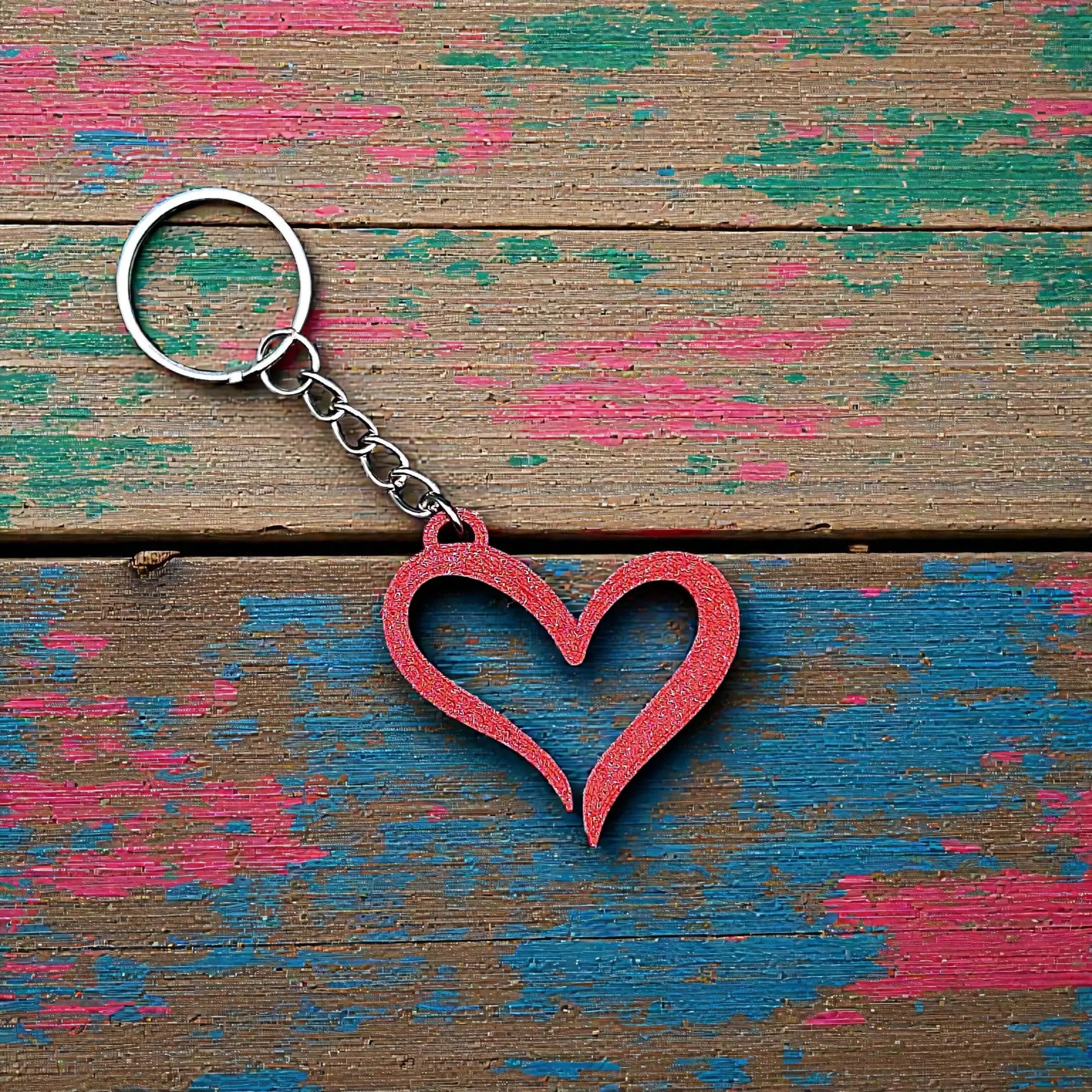 Handmade and customizable heart keychain in red, perfect for Valentine's Day, party favors, baby showers, or everyday gifts.
