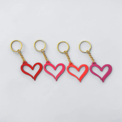 Handmade and customizable heart keychains with gold keyring, perfect for Valentine's Day, party favors, baby showers, or everyday gifts.