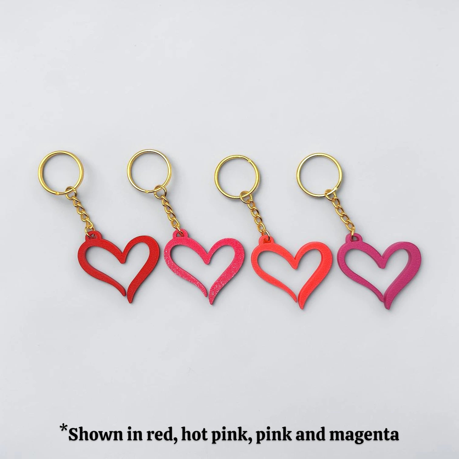 Handmade and customizable heart keychains in unique colors, perfect for Valentine's Day, party favors, baby showers, or everyday gifts.