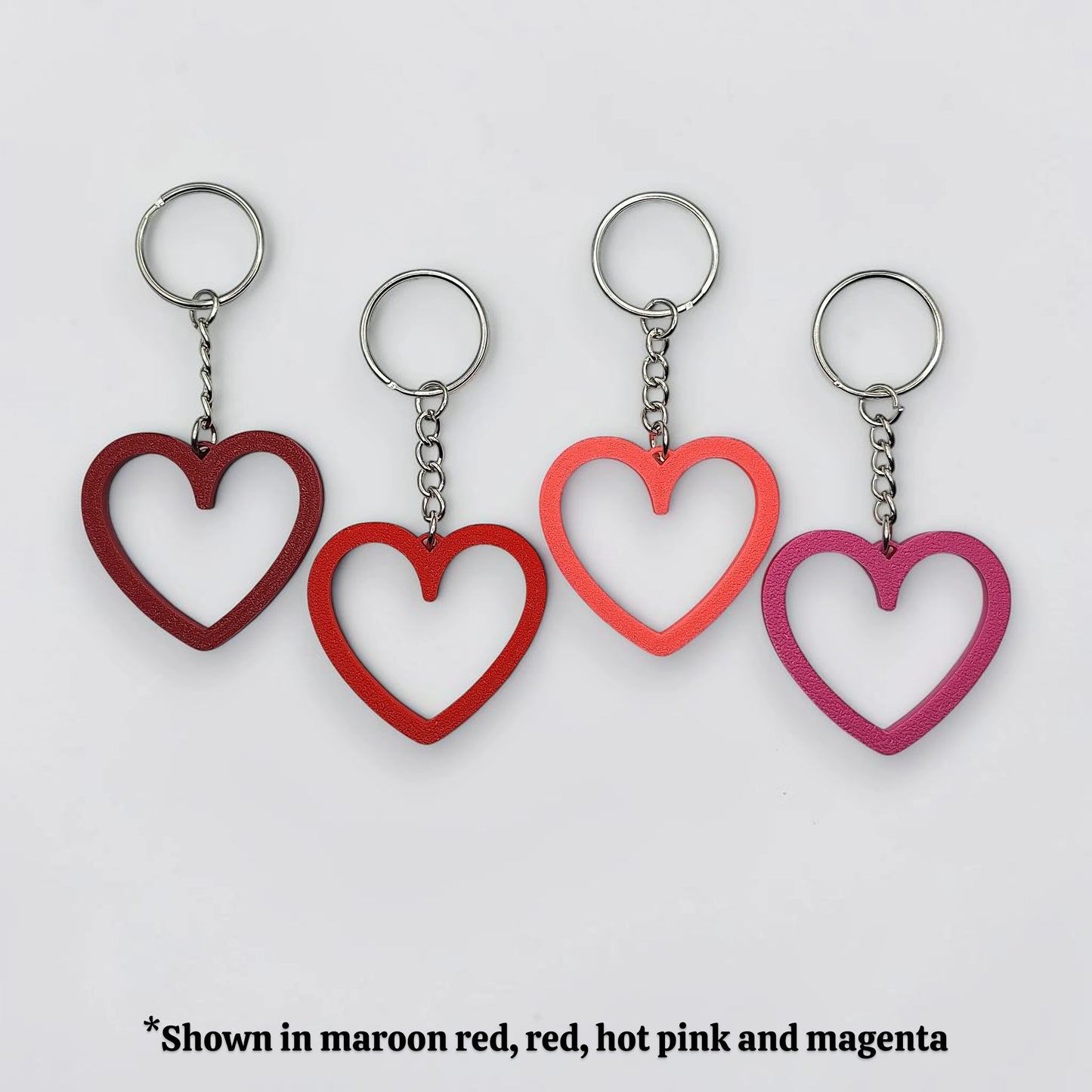 Heart keychains with silver keyrings, perfect for Valentine's Day gifts, wedding party favors, stocking stuffers and class prizes.