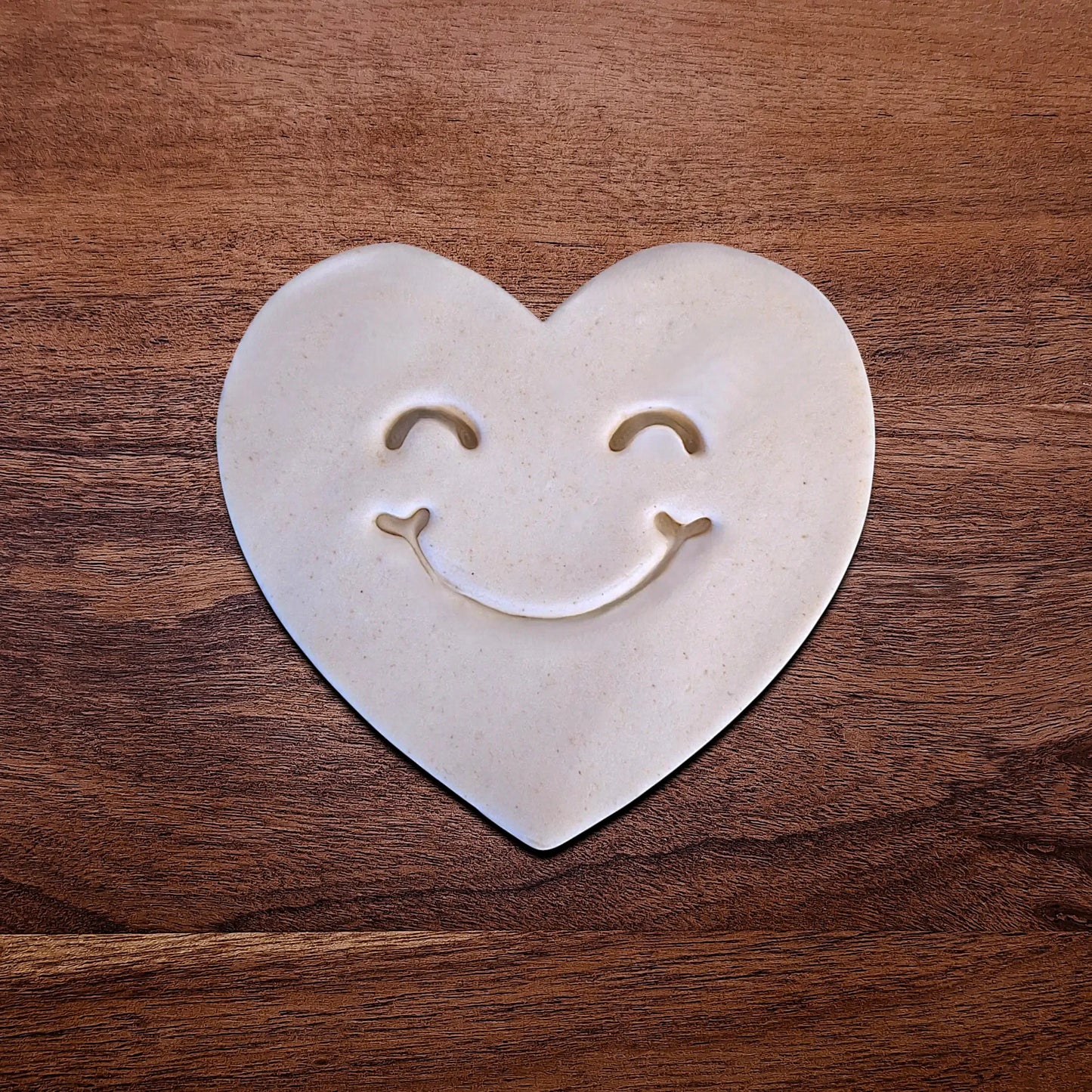 Handmade and customizable heart cookie cutter dough cutout and imprint, perfect for Valentine's Day baking, sweet treats and party favor creations.