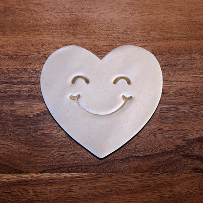 Handmade and customizable heart cookie cutter dough cutout and imprint, perfect for Valentine's Day baking, sweet treats and party favor creations.