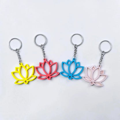 Lotus flower keychains shown in multiple colors, eco-friendly and handmade, perfect for spiritual gifts or mindful accessories.