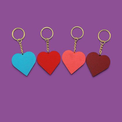 Four heart shaped keychains, perfect for Valentine's Day gifts, wedding favors, and event party favors.