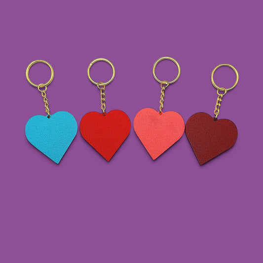 Four heart shaped keychains, perfect for Valentine's Day gifts, wedding favors, and event party favors.