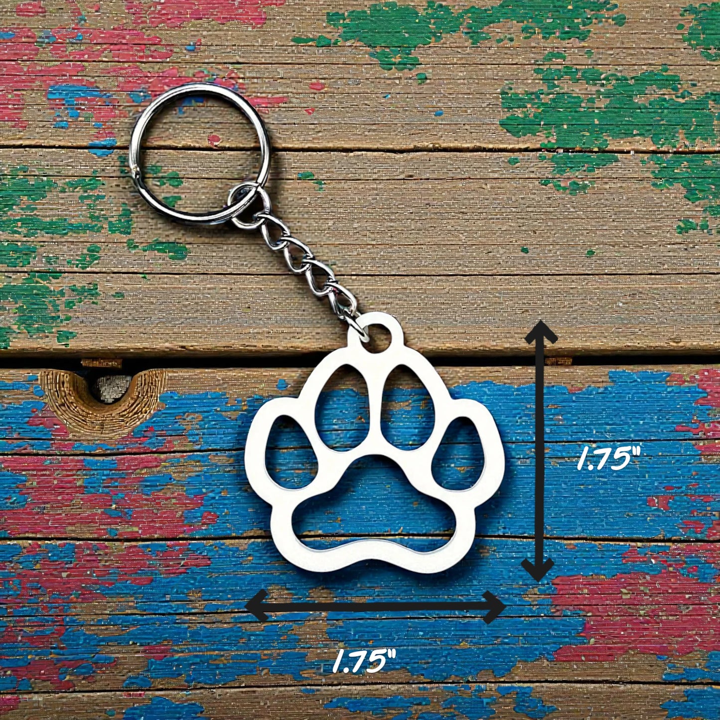 White paw keychain with clean silhouette, eco-friendly and handmade, ideal for honoring pets, gifting to animal lovers, or everyday use.